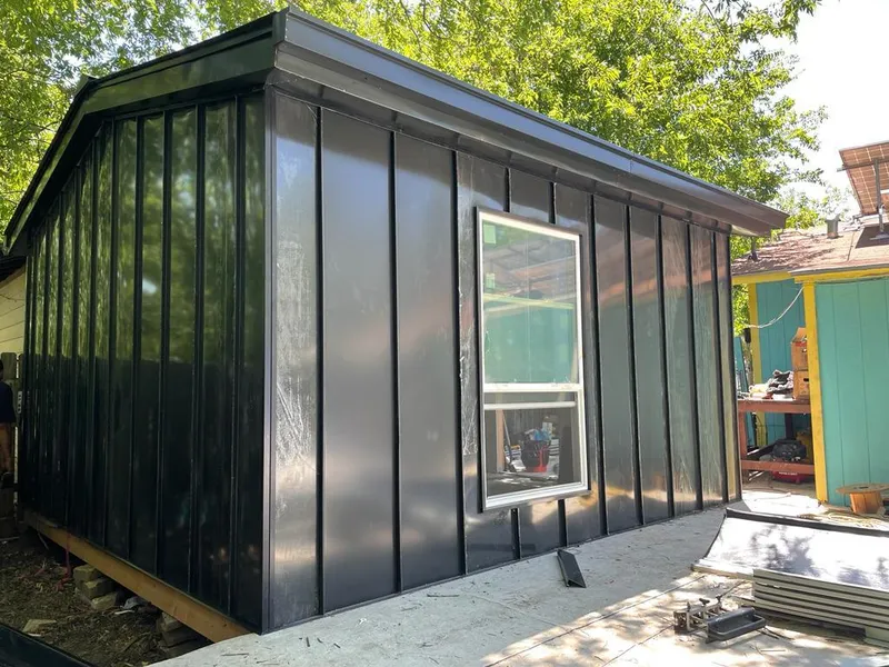 Black standing seam metal wall panels for Metal Roof Installation in East Alton