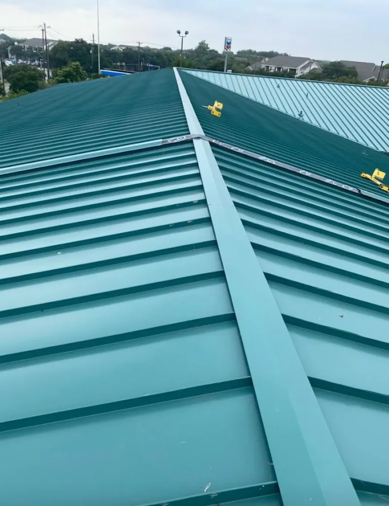 Green commercial metal roof ridge and valley for Metal Roof Repair in East Alton
