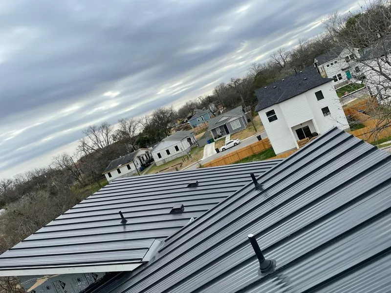 Standing seam metal roof panels with vents for Skylight Repair in East Alton